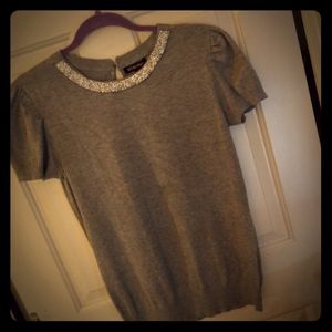 Grey sweater-like blouse